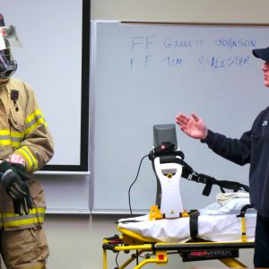 thumbnail image of A firefighter talking to a class