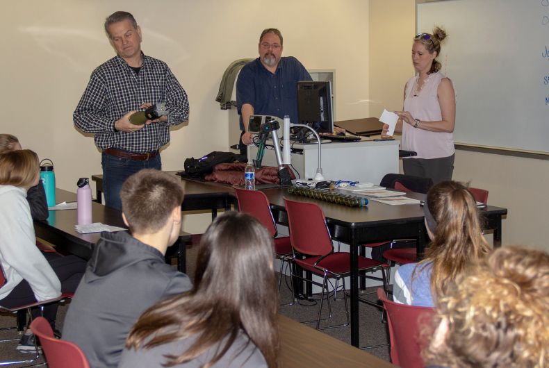 A class interacting during a career fair