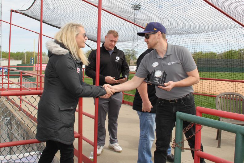 A group of ambassadors at a ribbon cutting