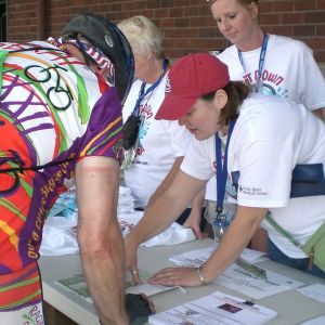 thumbnail image of Volunteers at a booth