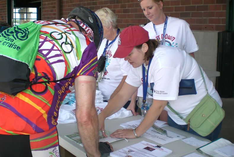 Volunteers at a booth