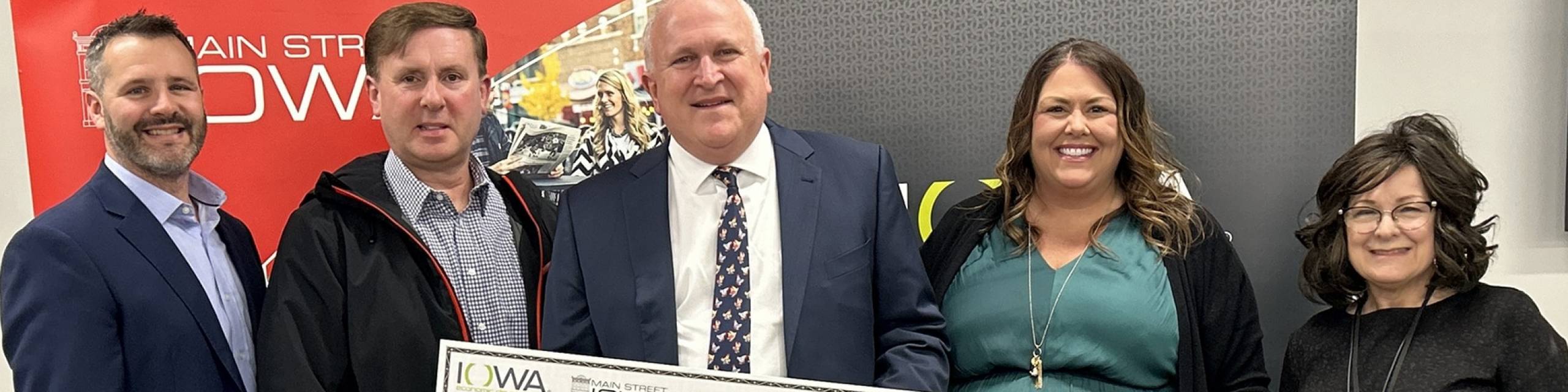 A woman holding a sign